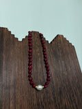 Maroon pearl necklace