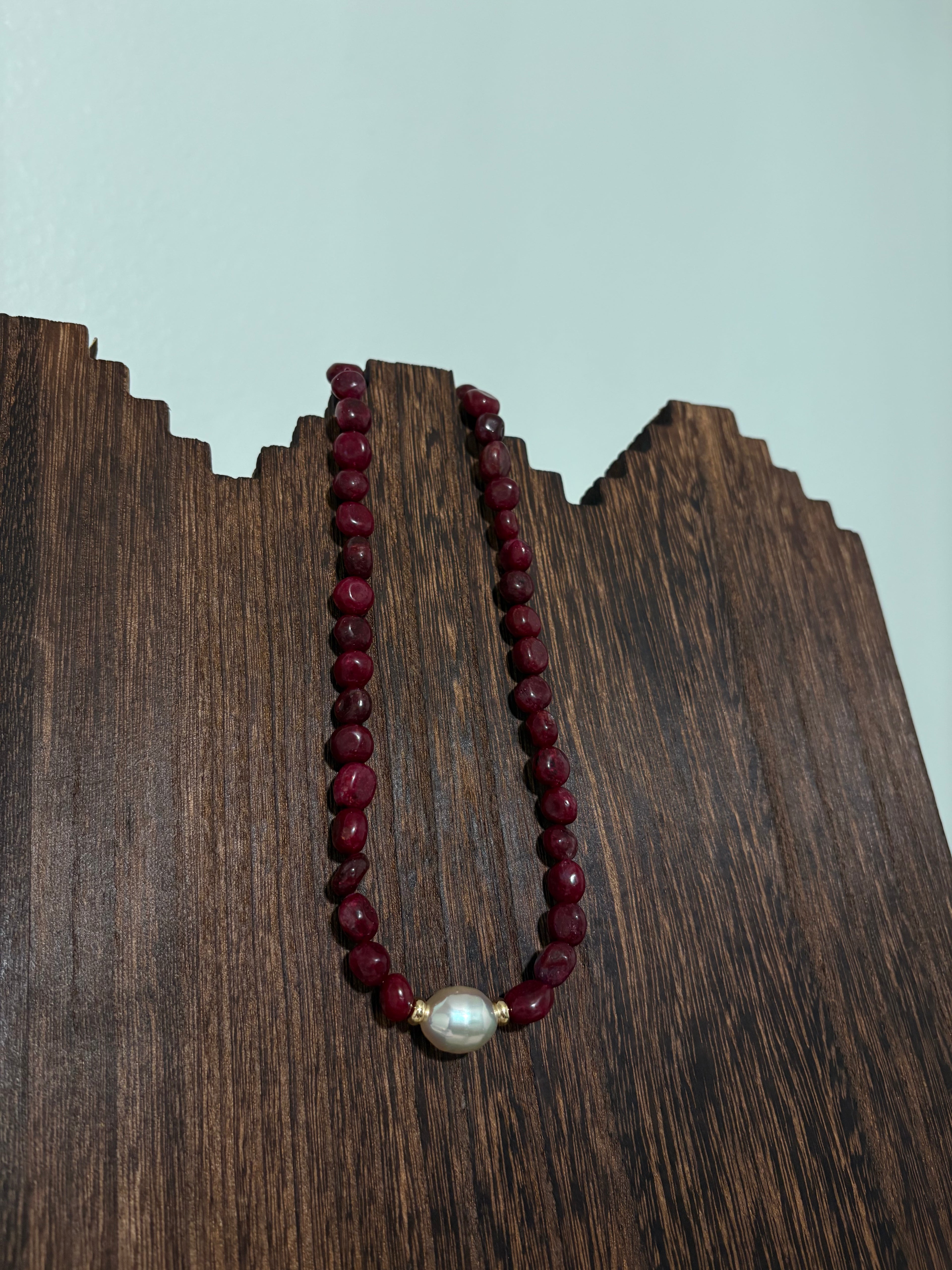 Maroon pearl necklace